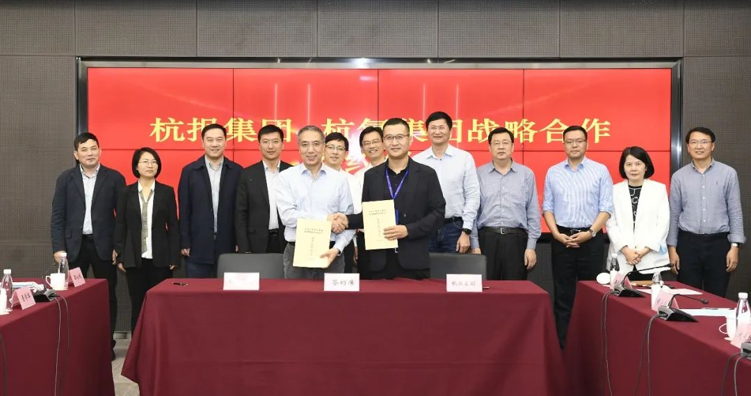yth2222游艇会官方网站集团与杭报集团签订战略合作协议(图1)